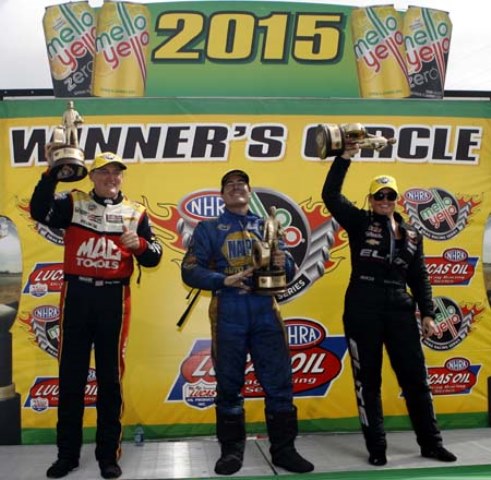 Doug Kalitta, Ron Capps, and Erica Enders-Stevens celebrate in the Winner's Circle after winning the NHRA SpringNationals in Houston Sunday. (Image courtesy of NHRA)