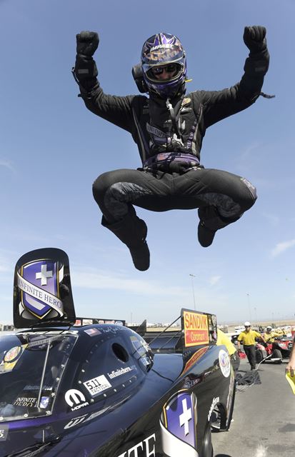 Jack Beckman celebrates his NHRA Funny Car win Sunday in Sonoma, CA. (Image/NHRA)