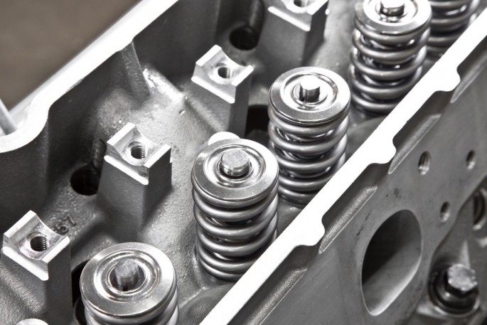Thanks to the lightweight valves, excessive spring pressure isn’t necessary. The PAC valvesprings feature 235 pounds of seat pressure and 520 pounds of open pressure. Titanium retainers and valve locks reduce mass compared to the steel factory GM hardware. 