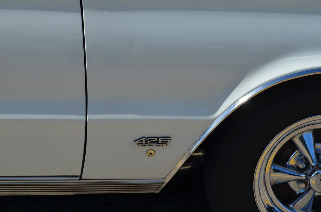 White 1966 Plymouth Satellite 426 HEMI badge