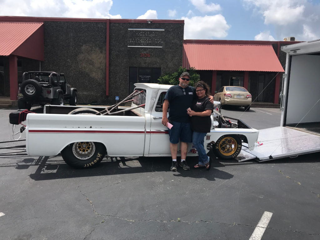 Eddie-and-Wife-with-Chevy-C10-on-Trailer