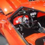cockpit view of a custom muscle car