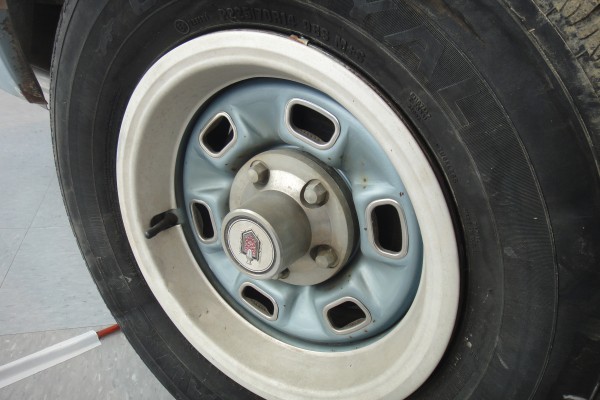 close up of a wheel on a vintage chevy el camino