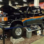 lifted ford bronco custom suv at indoor car show