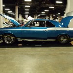 side view of a first gen chevy malibu with custom paint & wheels