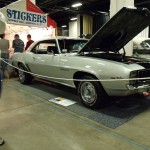 silver 1969 chevy camaro z/28 at indoor car show