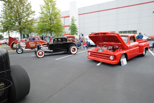 classic cars and crowds at a show