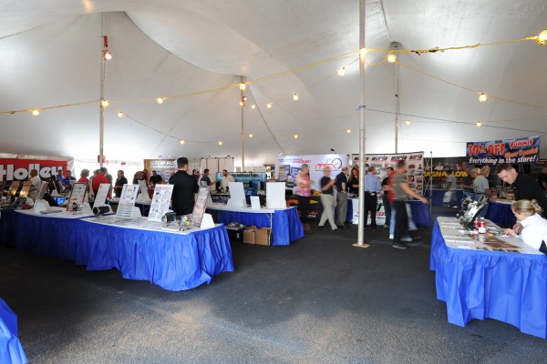 automotive trade show display booths under a tent