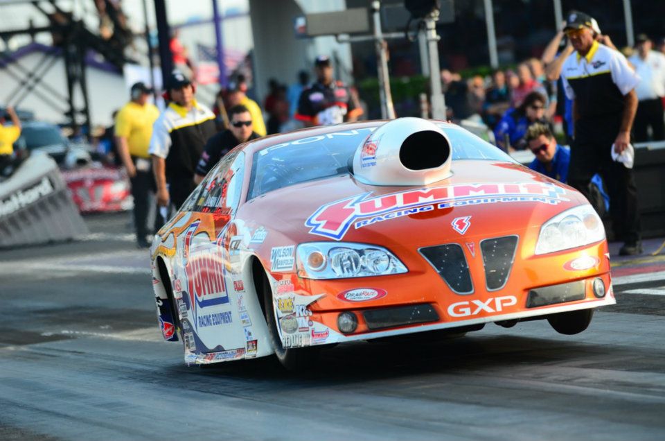 jason line launching his pro stock pontiac during drag race, 2012