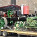antique green farm tractor display at car show thumbnail