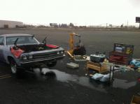 swapping an el camino engine in a parking lot