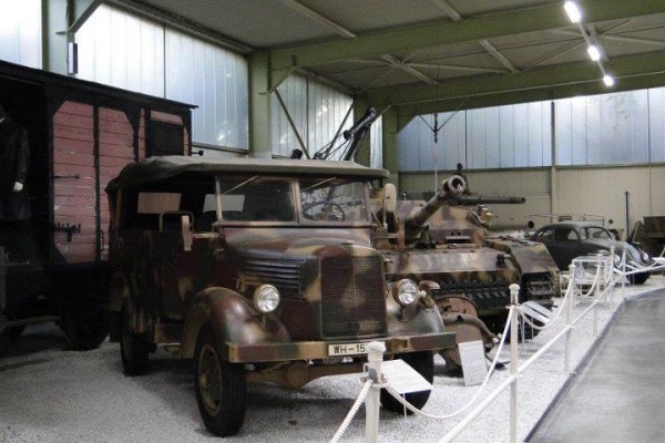 vintage military vehicles in a museum display