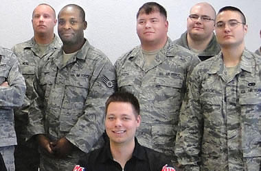 NHRA Drivers taking photos with military troops stationed overseas