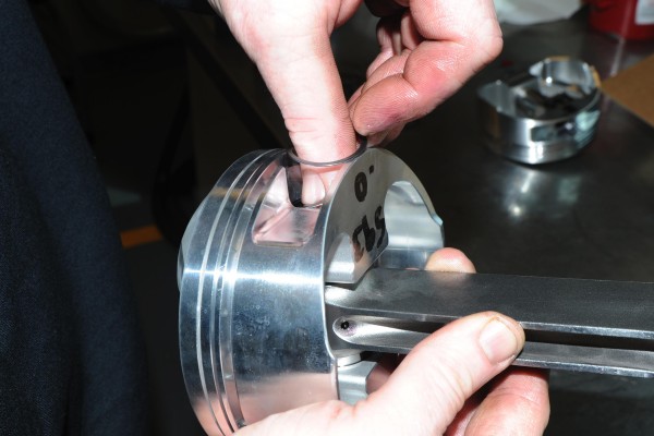 installing wristpin locks into a piston