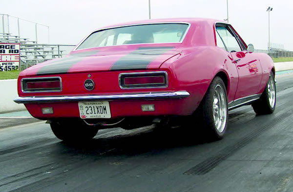 rear view of a 1967 chevy camaro rs on dragstrip