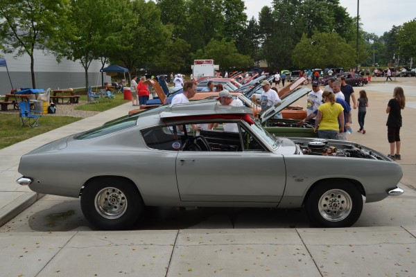 silver plymouth second gen barracuda at car show