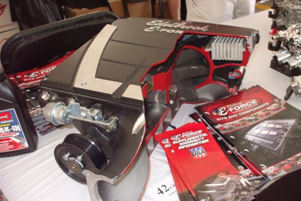 edelbrock supercharger on display at automotive trade show