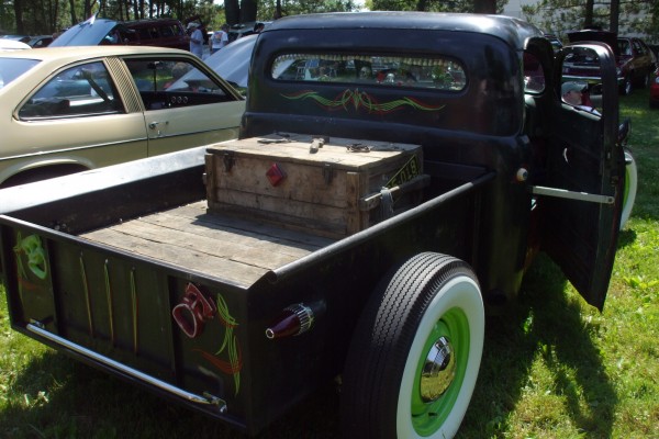 rear view of wooden bed in a vintage rat rod truck
