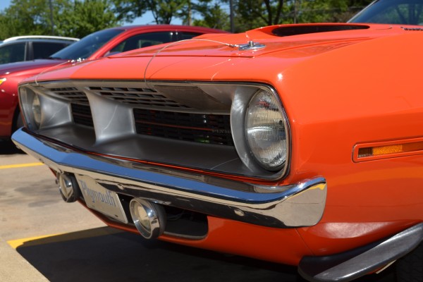 close up of front headlight on a plymouth barracuda