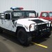 White police Humvee thumbnail