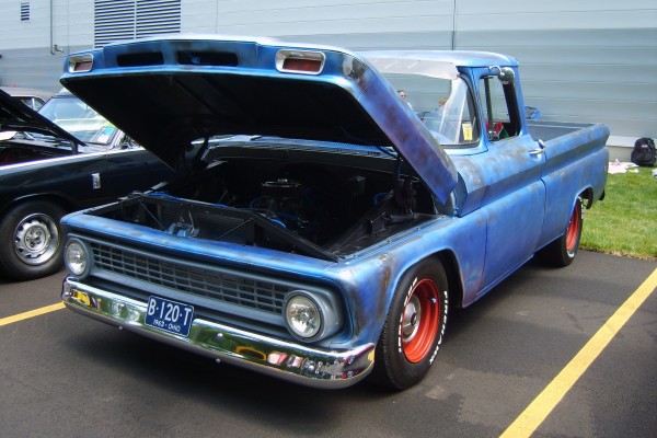 blue 1963 chevy pickup truck with hood up