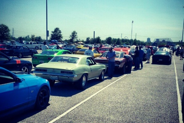 huge lineup of cars staging before a drag race