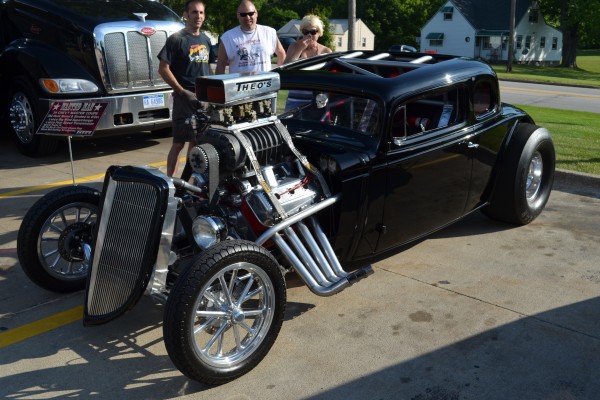 hot rod ford coupe with supercharged v8