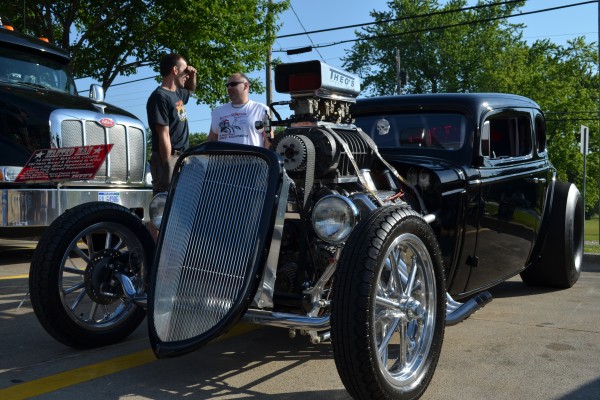 hot rod ford coupe with supercharged v8