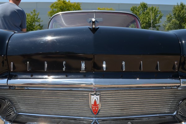 Close up of oldsmobile hood emblem on an 88 coupe
