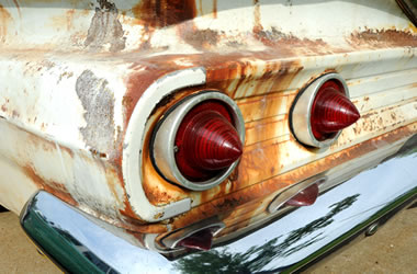 close up of taillights on a rusty car