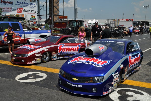 two summit racing nhra pro stock camaros prior to a drag race