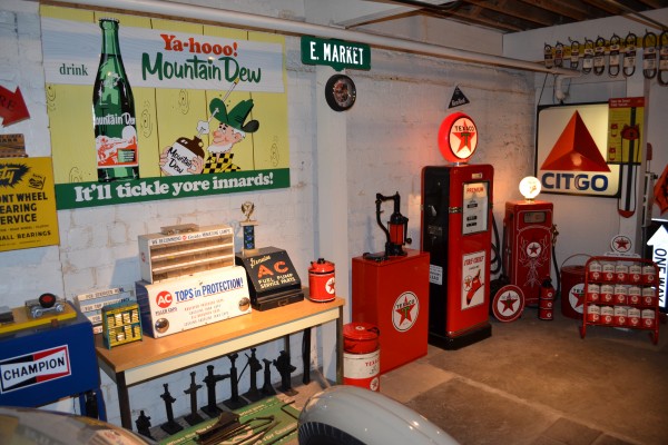 vintage tin signs and gas pump collection