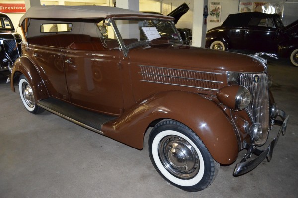 brown 1936 ford phaeton sedan in antique car collection