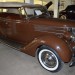 brown 1936 ford phaeton sedan in antique car collection thumbnail