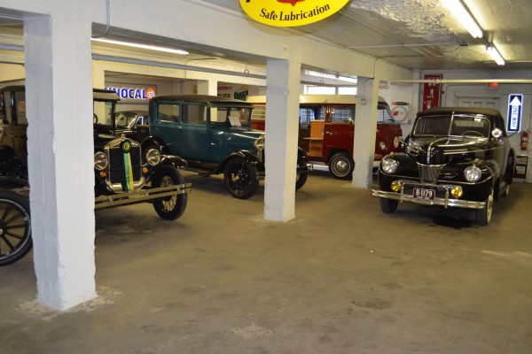 antique cars stored in indoor collection