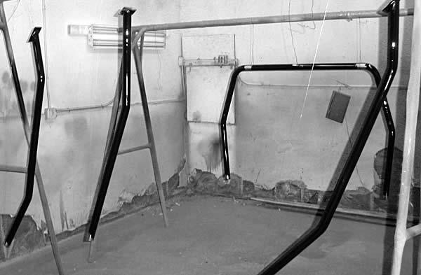 roll bar in a paint spray booth