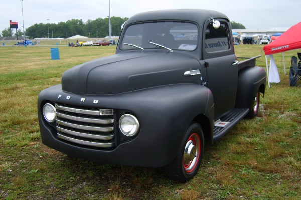 vintage primer black ford f-1 pickup truck
