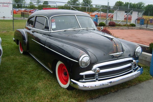 vintage postwar chevy coupe hot rod with pinstripes