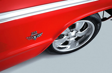 wheel and emblem on a custom chevy impala convertible