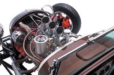 tri power engine in a vintage hot rod