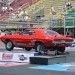 vintage dodge challenger race car doing a wheelstand at launch thumbnail