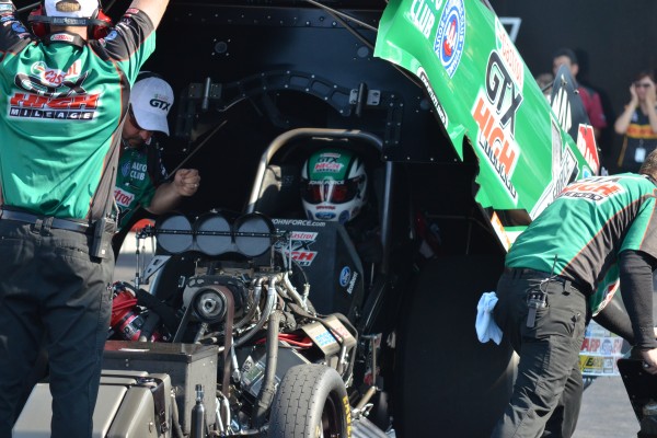 john force in the cockpit of his NHRA funny car prior to a race