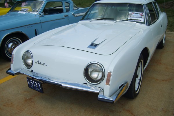 White 1963 Studebaker Avanti Coupe at Summit Racing Car Show