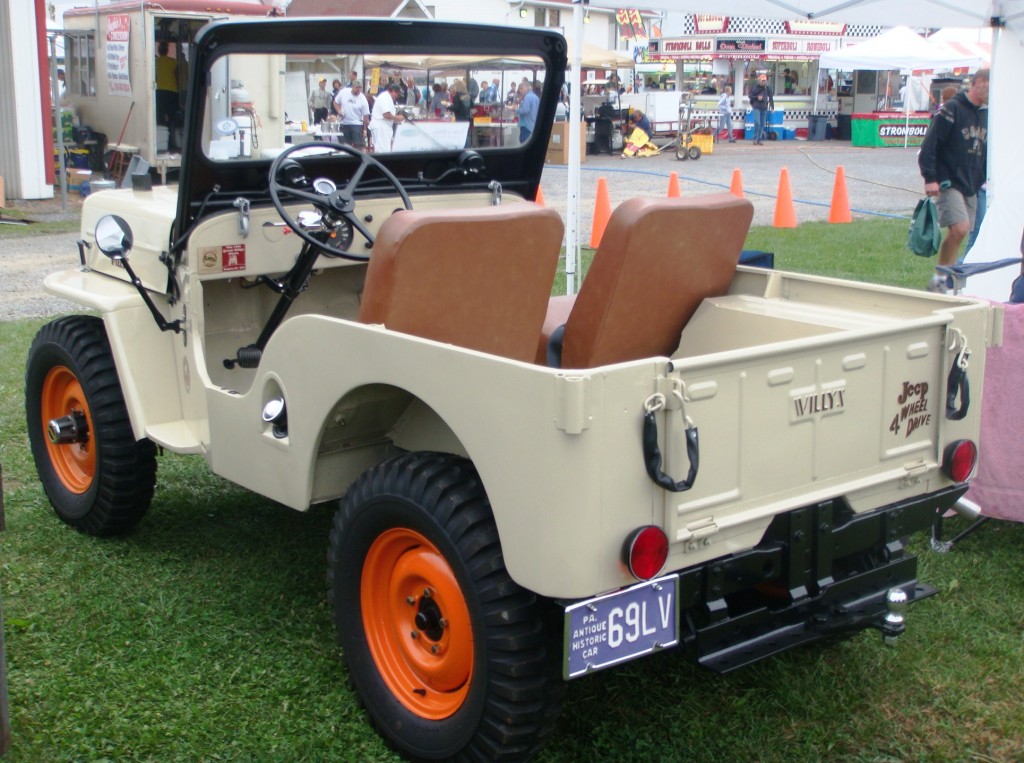 Classic Willys Jeep with orange wheels