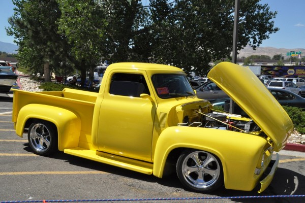 yellow custom ford pickup truck