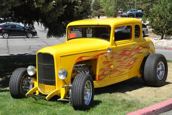 yellow flamed ford five window hot rod