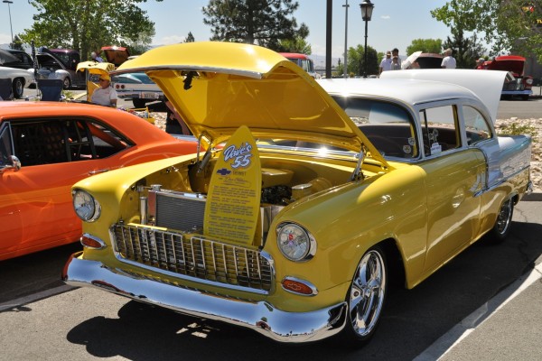 yellow and white 1955 chevy coupe