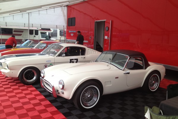 row of vintage shelby race cars at Monterey Car Week, 2012
