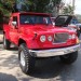 Classic red Jeep truck thumbnail