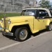 Classic yellow Jeepster thumbnail